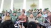 Presiden Jokowi dan Wapres Jusuf Kalla usai bertemu dengan jajaran petinggi TNI di Istana Bogor, Jumat (28/11) (VOA/Andylala)