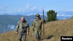 Russian President Vladimir Putin is seen during his holiday in the Siberian taiga, Russia, Oct. 7, 2019.