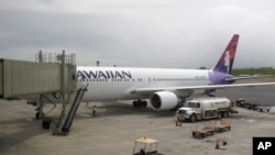 Hawaiian Airlines Flight 45 arrives from San Jose, Calif., in Kahului Airport in Kahului, Hawaii, on April 21, 2014.