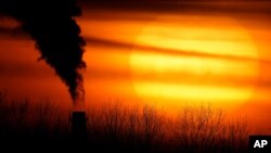 United Nations report released on Thursday, Feb. 18, 2021 says humans are making Earth a broken and increasingly unlivable planet through climate change, biodiversity loss and pollution. So the world must make dramatic changes to society, economics and daily life. (AP Photo/Charlie Riedel)