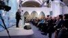 Ukrainian President Petro Poroshenko (L) speaks during the 12th Annual Meeting organized by the Yalta European Strategy (YES) in partnership with the Victor Pinchuk Foundation in Kiev, Sept. 11, 2015.