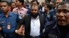 Bangladesh Factory Owners Surrender Over Deadly Fire