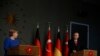 Germany's Chancellor Angela Merkel talks during a news conference with Turkey's President Recep Tayyip Erdogan following their meeting in Istanbul, Jan. 24, 2020. 