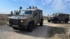 Israeli military vehicles patrol in the Israeli-occupied Golan Heights near the border with Syria on Dec. 6, 2024.