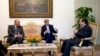 FILE - Egypt's President Abdel Fattah al-Sisi, right, and Foreign Minister Sameh Shoukry, left, meet with U.S. Secretary of State John Kerry at Cairo’s presidential palace Oct. 13, 2014. 