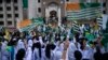 People wave Kashmiri flags to express solidarity with Indian Kashmiris during a rally at the Prime Minister office in Islamabad, Pakistan, Aug. 30, 2019.