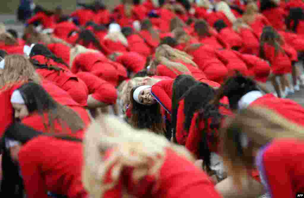 Cheerleaders from the U.S. prepare to take part in a New Year&#39;s Day Parade in central London, England.