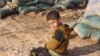 FILE - Children fleeing their homes in Iraq rarely receive mental health treatment, despite often being victims of or witnesses to extreme violence. Haj Ali, Iraq, Feb. 28, 2018.