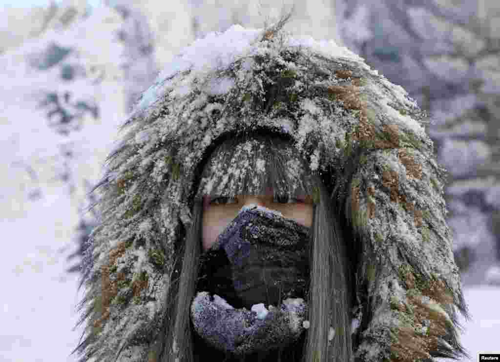A woman takes a selfie in a snowy wood on the bank of the Yenisei river, with the air temperature at about minus 21&deg;&nbsp;C (- 5.8&deg; F), outside the Siberian city of Krasnoyarsk, Russia.