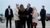 U.S. Secretary of State Mike Pompeo and his wife Susan Pompeo speak with Jacques Jouslin de Noray of the French Foriegn Ministry and U.S. Ambassador to France Jamie McCourt, after arriving at Paris-Le Bourget Airport, in Le Bourget, France, Nov. 14, 2020.