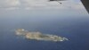 FILE - Photograph taken on a marine surveillance plane B-3837 shows the disputed islets, known as Senkaku in Japan and Diaoyu in China.