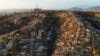 An aerial view shows the remains of houses burnt following the spread of wildfires in Vina del Mar, Chile Feb. 5, 2024.