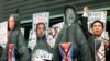 South Korean protesters display effigies of North Korean leader Kim Jong Un, center, and late leaders Kim Jong Il, right, and Kim Il Sung at an anti-North Korea protest on the birthday of Kim Il Sung in Seoul, South Korea, April 15, 2013.