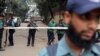 Bangladeshi police stand guard in front of the house of former Prime Minister and main opposition Bangladesh Nationalist Party (BNP) leader Khaleda Zia during a 48-hour nationwide strike called by her party, in Dhaka, Bangladesh, Jan. 6, 2014. 