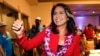 FILE - In this Nov. 6, 2018, file photo, Rep. Tulsi Gabbard, D-Hawaii, greets supporters in Honolulu. Gabbard has announced she’s running for president in 2020. 