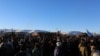 Water protectors celebrate the decision of the Army Corps to deny the building of the Dakota Access Oil Pipeline through their and sacred Sioux land (E. Sarai/VOA)