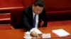 ཧོང་ཀོང་བ་ཚོས་རྒྱ་ནག་དམར་ཤོག་ཚོགས་པར་ངོ་རྒོལ་བྱེད་ཀྱི་ཡོད་པ།