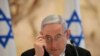FILE - Israeli Prime Minister Benjamin Netanyahu attends the first Cabinet meeting of the new government at Chagall Hall in the Knesset, the Israeli Parliament, in Jerusalem, Israel, May 24, 2020.