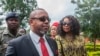 Saulos Klaus Chilima, a petitioner in the Malawi elections case, accompanied by his wife, Mary, waits to be screened at Lilongwe High Court, where judges later annulled the May 2019 election, in Lilongwe, Feb. 3, 2020.