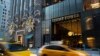 FILE - Traffic passes Trump Tower in New York, Nov. 21, 2016. 