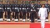 Sri Lanka’s President Maithripala Sirisena inspects a guard of honor during a ceremonial reception at the Indian Presidential Palace in New Delhi, India, Feb. 16, 2015. 