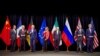 Secretary Kerry poses for a group photo with fellow EU, P5+1 foreign ministers and Iranian Foreign Minister Zarif after reaching Iran nuclear deal, in Vienna, Austria, July 14, 2015.