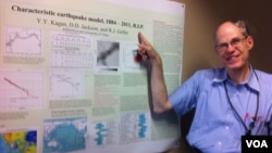Tokyo University professor Robert Geller points to a poster of a soon-to-be-published document he co-authored asserting characteristic earthquake models developed in the past should be considered dead and buried. (Photo: VOA/Steve Herman)