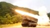FILE - A rocket is launched from an MLRS during a training exercise involving part of the U.S. 2nd Infantry Division and the South Korean army at Cheorwon, South Korea, June 2012.