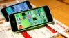 FILE - These then-new Apple iPhone 5c models were on display in at Tokyo store, Sept. 20, 2013. A 5c was at the center of Apple's battle with the FBI over efforts to break the company's proprietary auto-destruct security system. 