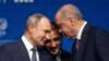 In this Jan. 8, 2020 file photo, Turkey's President Recep Tayyip Erdogan, right and Russia's President Vladimir Putin talk during a ceremony in Istanbul for the inauguration of the TurkStream pipeline.