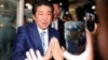 Japan's Prime Minister Shinzo Abe, leader of the Liberal Democratic Party, greets his supporters after making a speech at an election campaign rally in Tokyo, Japan, Oct. 20, 2017. 