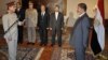Egyptian President Mohammed Morsi swears in newly-appointed Minister of Defense, Lt. Gen. Abdel-Fattah el-Sissi, in Cairo, Egypt, Sunday, Aug. 12, 2012.