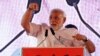 FILE - Indian Prime Minister Narendra Modi, campaigning ahead of state assembly elections, speaks at a rally in Mumbai, Oct. 9, 2014.