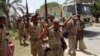 FILE - Members of Iraqi security forces arrive in Anbar Province to reinforce security forces in Ramadi, June 17, 2014. 