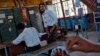 Students work at the electrical department of the Industrial Training Institute in Beed, about 350 km (220 miles) east of Mumbai, June 28, 2012. 