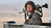 South Korean soldier stands on a military guard post near the demilitarized zone (DMZ) dividing the two Koreas in the border city of Paju on April 5, 2013. 
