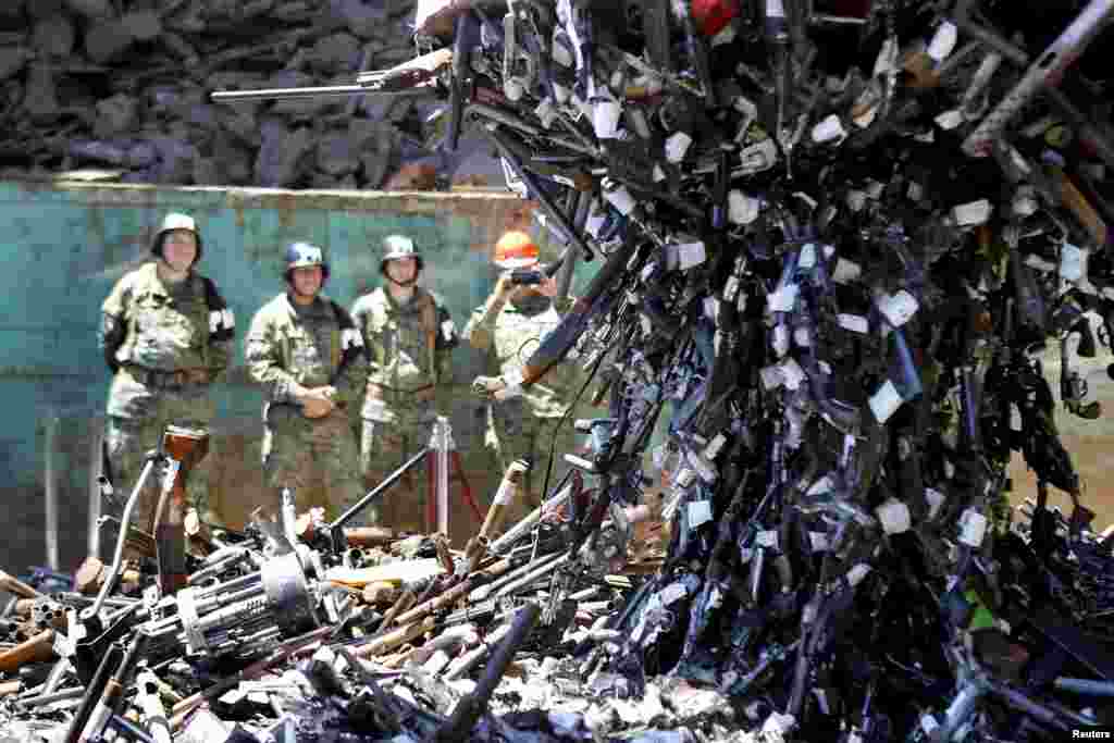 Confiscated weapons are destroyed at a foundry in Santiago, Chile.&nbsp;&nbsp;Nearly 13,000 firearms were destroyed as part of a government arms control program.&nbsp;