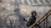A South Korean soldier walks up the stairs at an observation post, near the demilitarized zone (DMZ) which separates the two Koreas, in Paju, north of Seoul, March 12, 2013. 