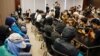 FILE - Family members of twelve Hong Kong activists, detained as they reportedly sailed to Taiwan for political asylum, hold a news conference to seek help in Hong Kong, Sept. 12, 2020.