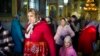 FILE - A woman leaves at the end of a religious service inside the Saint John the Baptist cathedral in Comrat, the capital of Gagauzia, an autonomous part of Moldova, Nov. 2, 2024.