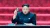 FILE - North Korean leader Kim Jong Un holds up a parliament membership certificate during the Supreme People's Assembly in Pyongyang, North Korea, April 9, 2014.