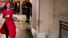 Rep. Ilhan Omar, Democrat-Minnesota, center, walks through the halls of the Capitol Building in Washington, Jan. 16, 2019.
