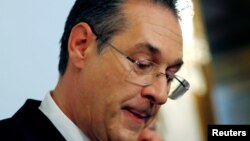 Austrian Vice Chancellor Heinz-Christian Strache reacts as he addresses the media in Vienna, May 18, 2019.