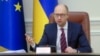 Ukrainian Prime Minister Arseniy Yatsenyuk speaks during a cabinet meeting in Kyiv, Ukraine, Nov. 25, 2015. 