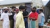 Sejumlah laki-laki dari pengungsi etnis Muslim-Rohingya saat berada kamp pengungsian di Gedung BLK Kota Lhokseumawe, Aceh, Kamis, 10 September 2020. (Foto: Courtesy/Humas Pemkot Lhokseumawe)