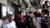 FILE - Rappler CEO Maria Ressa, second from left, talks to reporters after attending a hearing at Manila Regional Trial Court, Philippines, April 16, 2019.