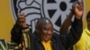 FILE - South African President Cyril Ramaphosa celebrates after being re-elected African National Congress president at the ANC national conference in Johannesburg, South Africa, Dec. 19, 2022. Ramaphosa announced the highly anticipated national election will be held May 29. 