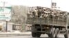 Soldiers are seen on a truck on the road in Maiduguri in Borno State, Nigeria, May 14, 2015.