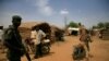 FILE - A policeman stands guard near the gold mining site in Anka, Zamfara, Nigeria.