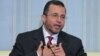 Egypt's new Prime minister, Hisham Qandil, speaks during his first news conference in Cairo, August 2, 2012. 